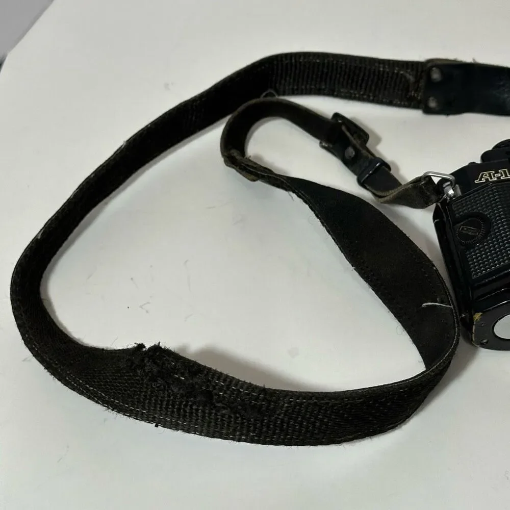 Vintage Canon A-1 Black 35 mm SLR with Strap/ Body Only